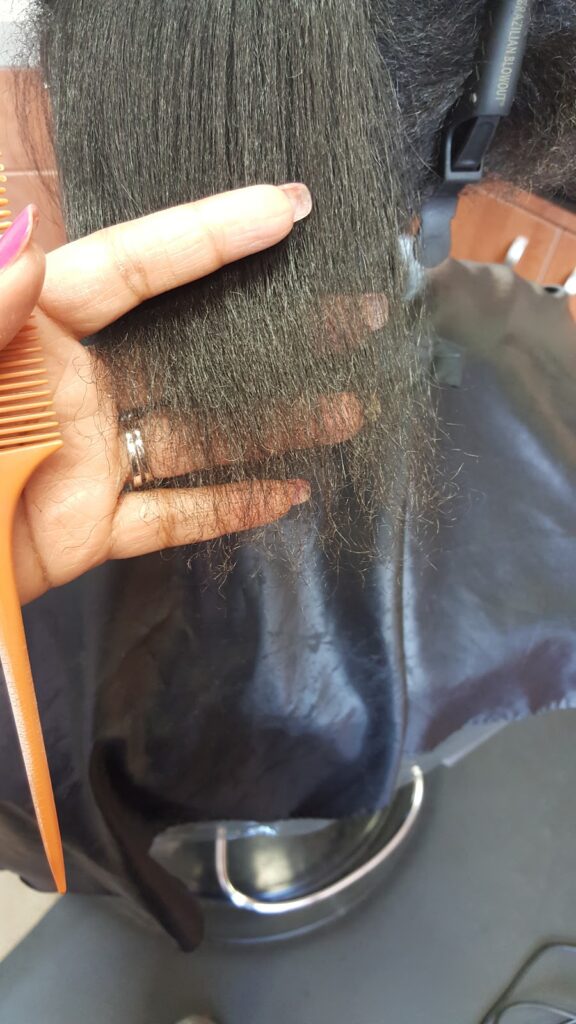 Hair ends being trimmed Hair ends being trimmed
