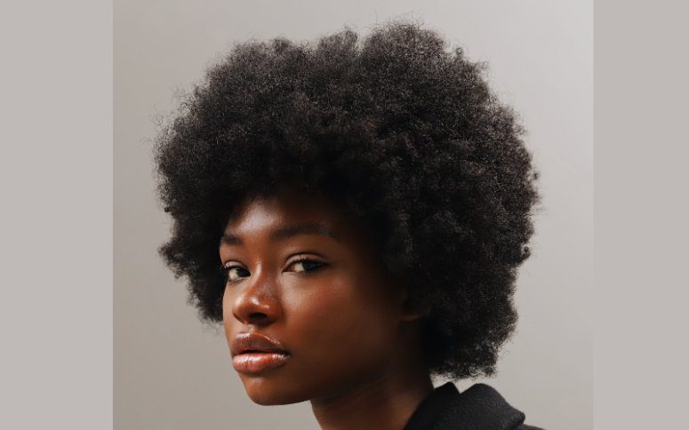 A lady with her natural hair combed out